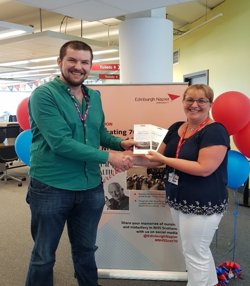 Second year student nurse, Andrew Brown, receiving his prize from lecturer Gillian Taylor.